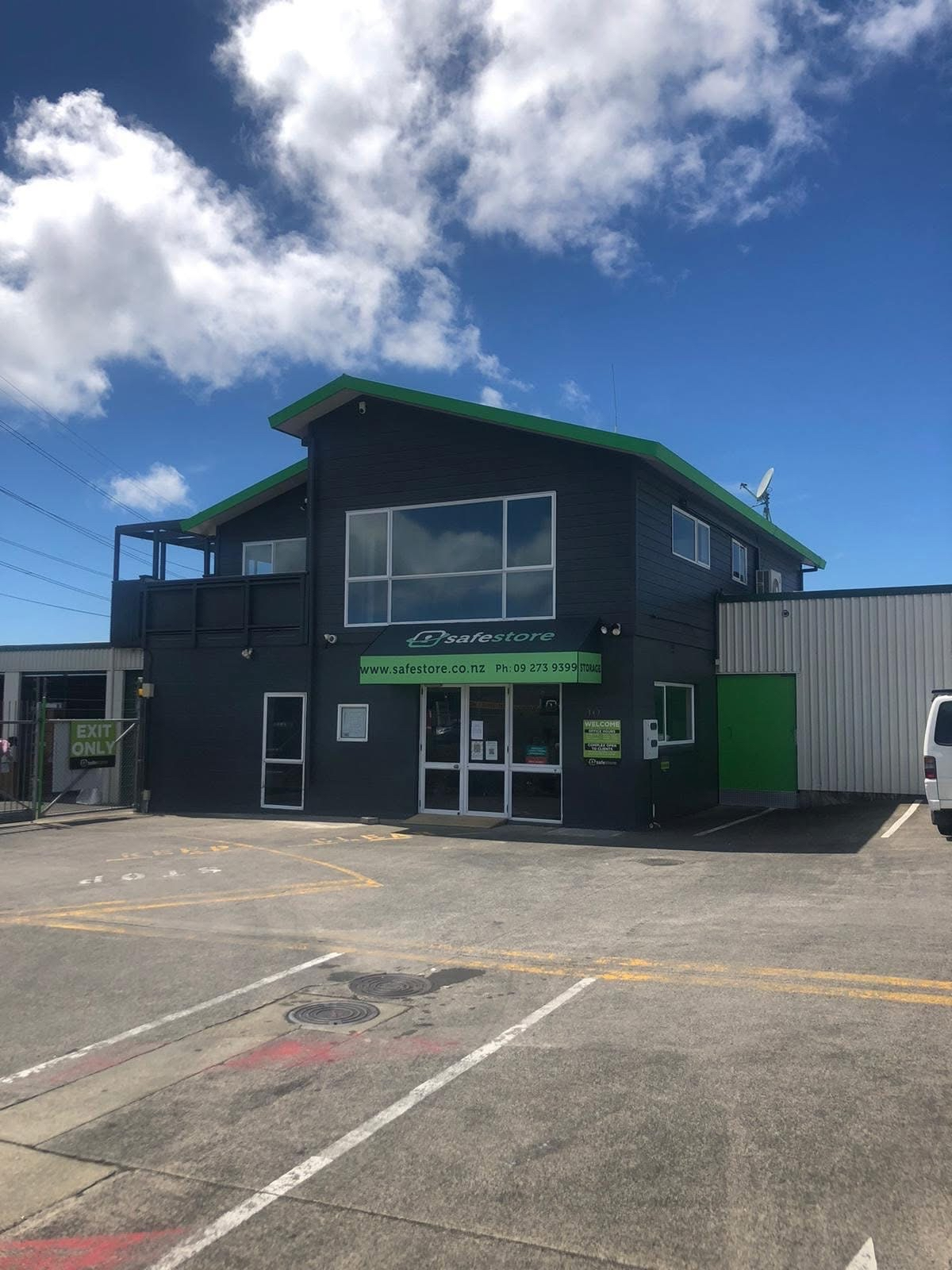 Commercial building exterior with freshly coated facade and trim